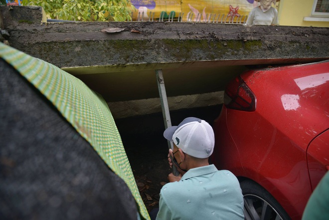 Vụ tường đổ đè bẹp 12 ô tô ở Hà Nội: Ai chịu trách nhiệm đền bù thiệt hại? - 5